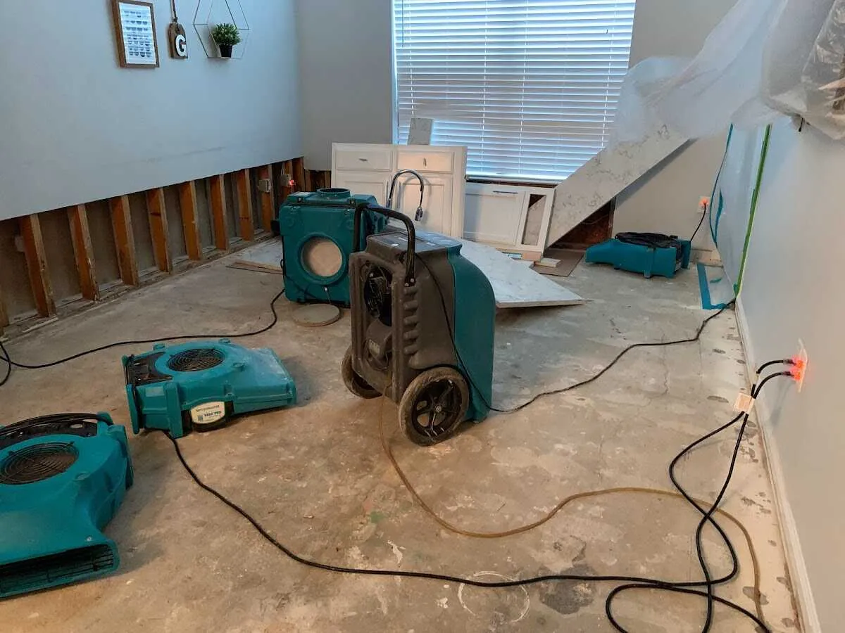 Dehumidifier in flood-cut room for Water Damage Restoration in Harrietstown