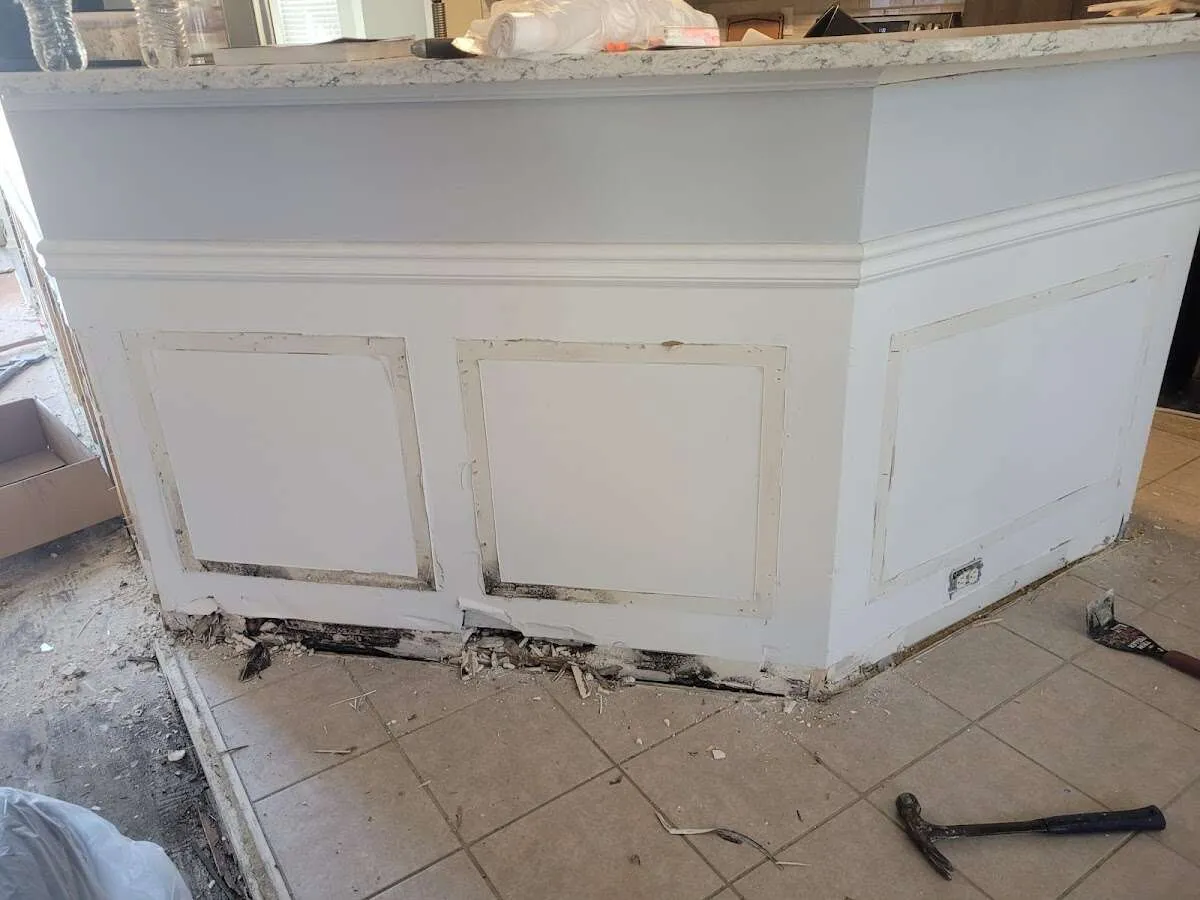 Water damage and mold on kitchen during Storm Damage Restoration in Harrietstown